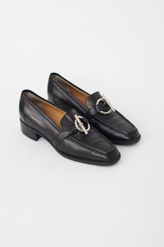 Hermès Black Leather 
Silver Toggle Loafer