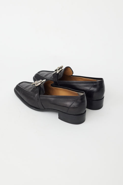 Hermès Black Leather 
Silver Toggle Loafer