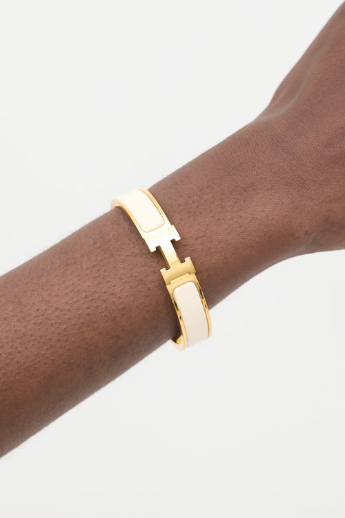 Hermès Gold 
White Clic H GM Bracelet