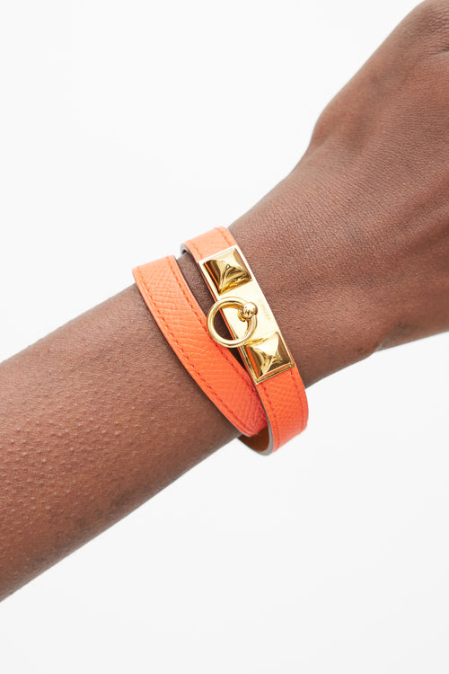 Hermès Orange 
Gold Double Tour Leather Bracelet