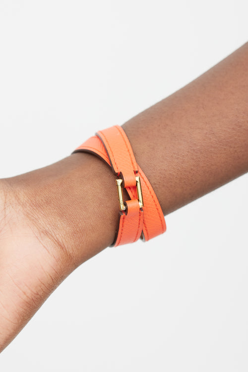 Hermès Orange 
Gold Double Tour Leather Bracelet