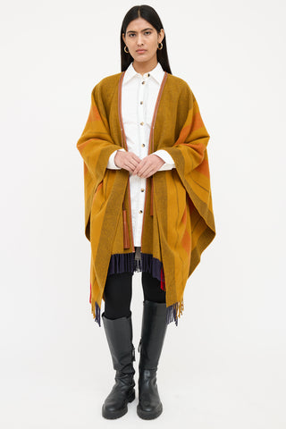 Hermès Wool 
Cashmere Rocobar Wrap Poncho