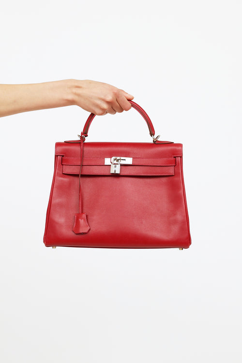 Hermès 2010 Rubis 
Rose Tyrien So Flash Tadelakt Kelly 32 Bag