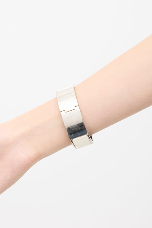 Hermès Silver 
White Clic Clac H Bracelet