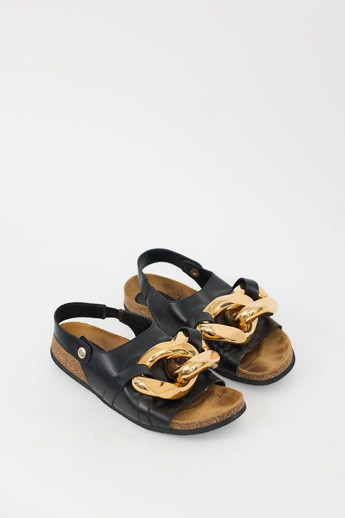 JW Anderson Black Leather 
Gold Chain Slingback Slide