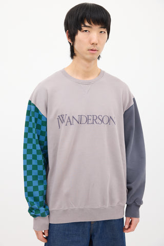 JW Anderson Purple 
Multi Checker Panel Logo Sweatshirt