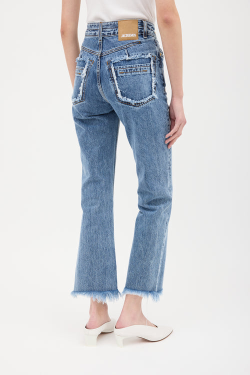 Jacquemus Light Wash Cropped Raw Hem Jeans