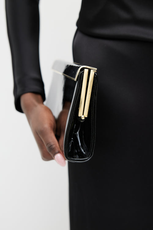 Jimmy Choo Black 
Gold Patent Leather Clutch