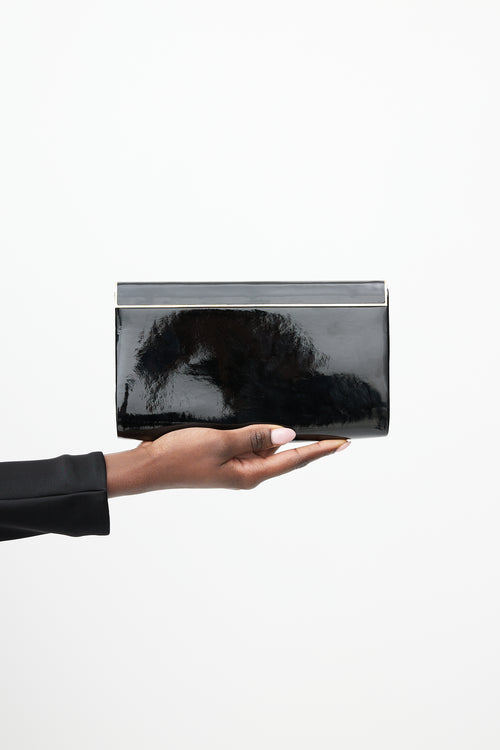 Jimmy Choo Black 
Gold Patent Leather Clutch