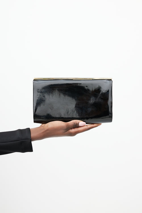 Jimmy Choo Black 
Gold Patent Leather Clutch