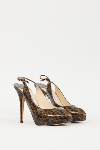 Jimmy Choo Brown 
Black Patent Leather Printed Slingback Heel