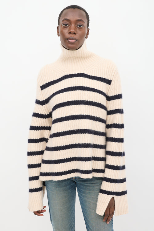 Khaite Cream 
Navy Cashmere Striped Turtleneck