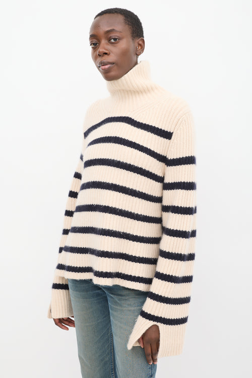 Khaite Cream 
Navy Cashmere Striped Turtleneck