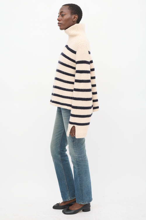 Khaite Cream 
Navy Cashmere Striped Turtleneck