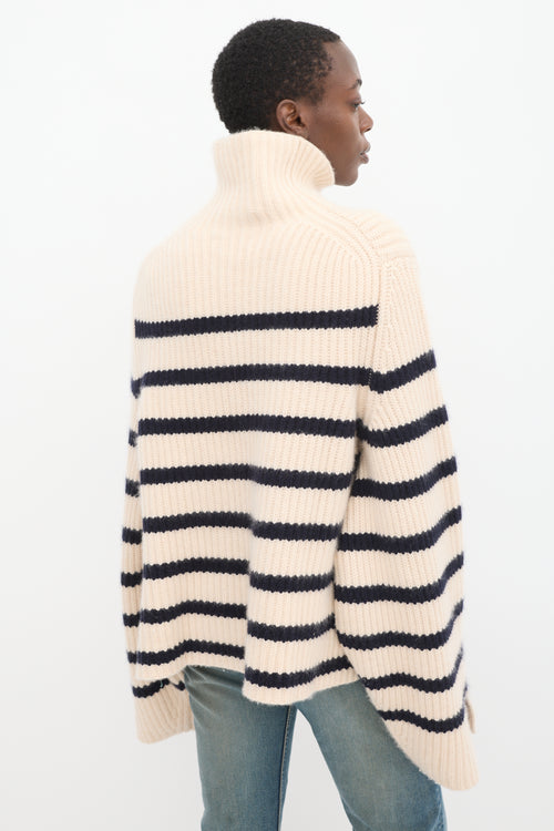 Khaite Cream 
Navy Cashmere Striped Turtleneck