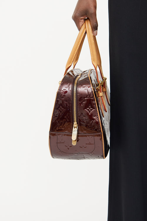 Louis Vuitton Amarante Summit Drive Bag