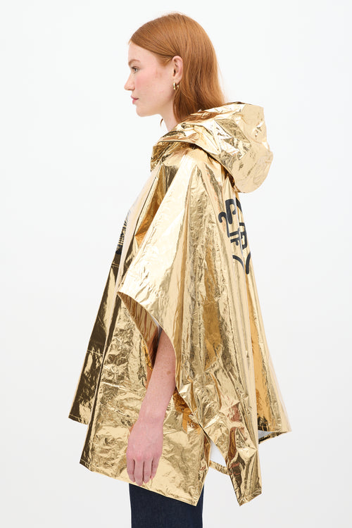 Louis Vuitton SS24 Gold Lamé Hooded Souvenir Poncho