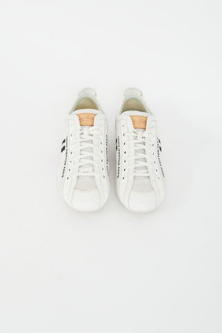 Louis Vuitton White Suede 
Canvas Logo Sneaker