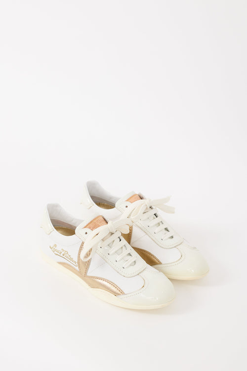 Louis Vuitton White 
Gold Leather Logo Sneaker