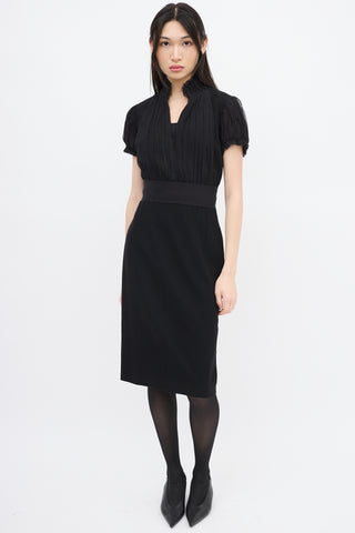 Alexander McQueen Black Wool 
Silk Puff Sleeve Dress