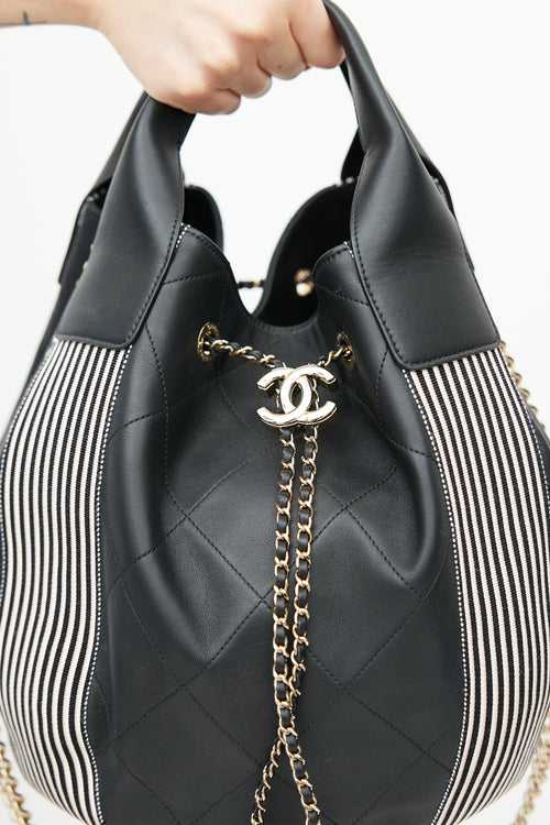 Chanel 2019 Black 
White Stitched Drawstring Leather Bag