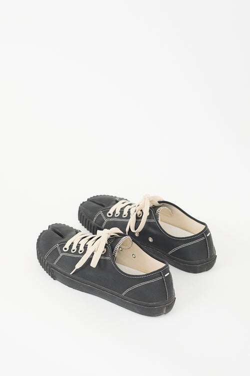 Maison Margiela Black 
Cream Canvas Tabi Sneaker