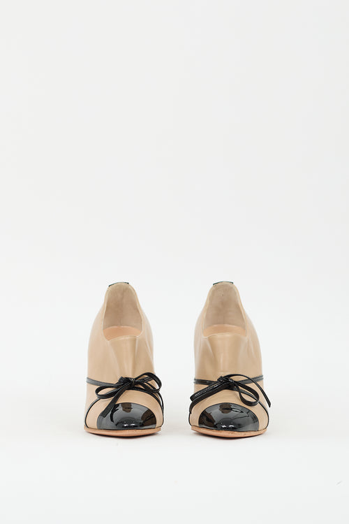 Manolo Blahnik Beige 
Black Leather Bow Pump