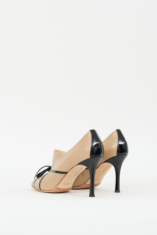 Manolo Blahnik Beige 
Black Leather Bow Pump