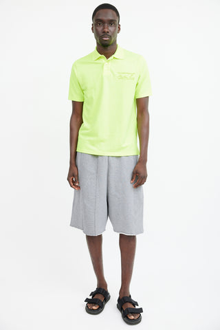 Martine Rose Neon 
Blue Green Logo Polo