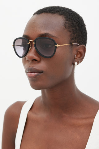 Miu Miu Black 
Gold SMU03Q Aviator Sunglasses