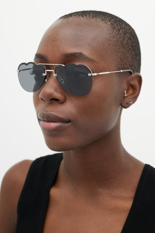 Miu Miu Black 
Silver Cloud Sunglasses