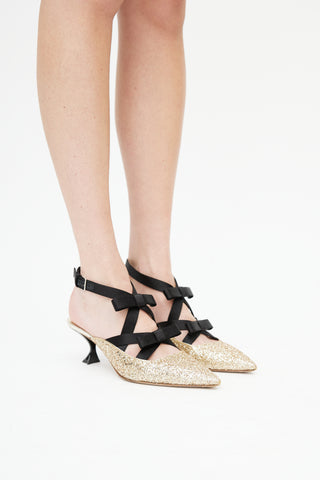 Miu Miu Gold 
Black Pointed Toe Bow Heel