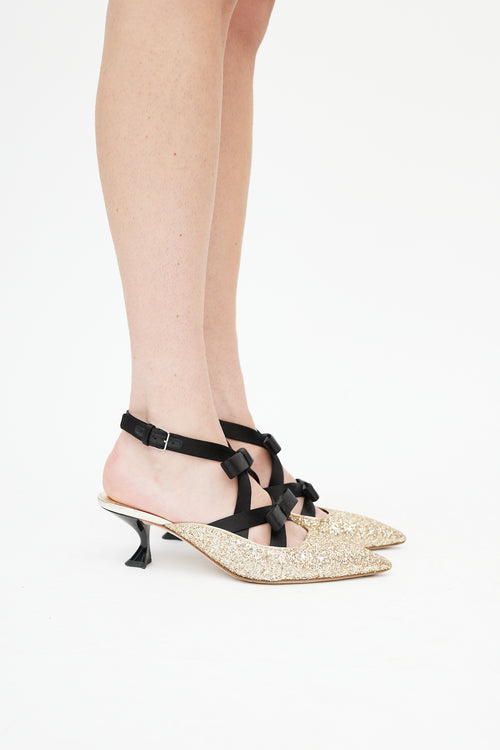 Miu Miu Gold 
Black Pointed Toe Bow Heel