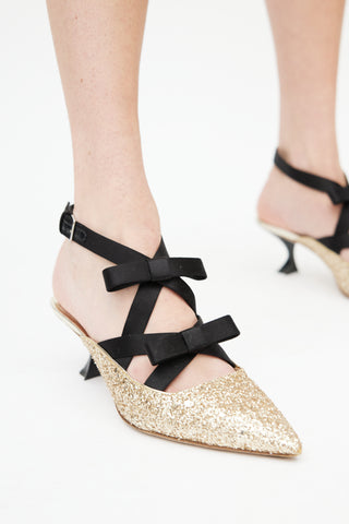 Miu Miu Gold 
Black Pointed Toe Bow Heel