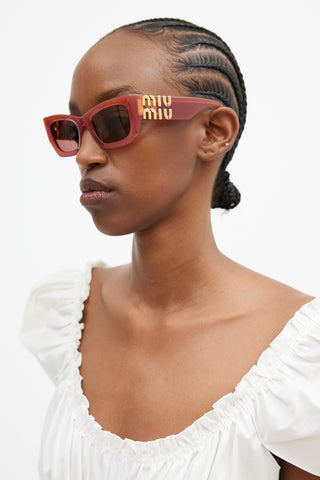 Miu Miu Pink 
Gold SMU09W Geometric Cat Eye Sunglasses