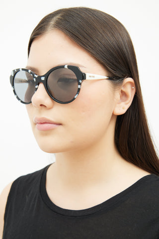 Miu Miu Black 
White SMU 06P Sunglasses