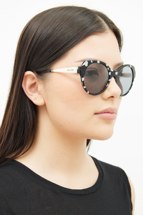 Miu Miu Black 
White SMU 06P Sunglasses