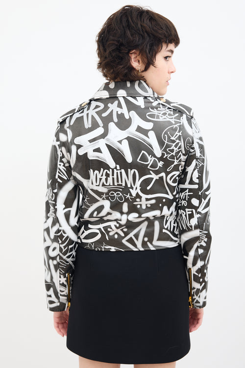 Moschino Couture Black 
White Leather Graffiti Biker Jacket