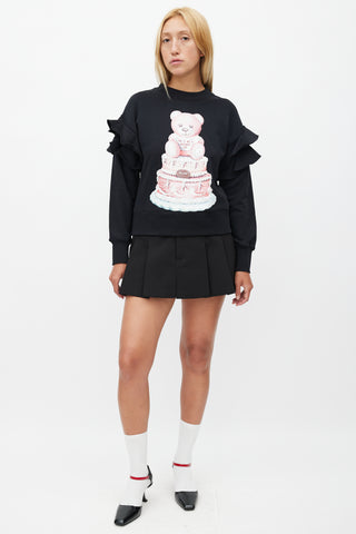 Moschino Couture! Black Cake Print 
Ruffle Sweatshirt