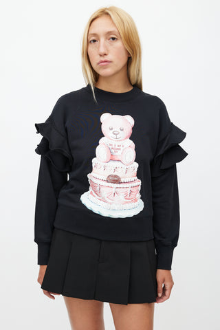 Moschino Couture! Black Cake Print 
Ruffle Sweatshirt