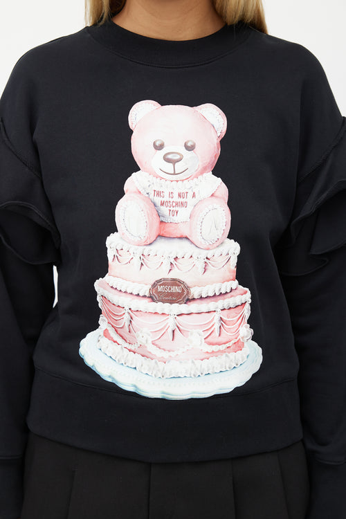 Moschino Couture! Black Cake Print 
Ruffle Sweatshirt