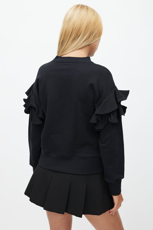 Moschino Couture! Black Cake Print 
Ruffle Sweatshirt