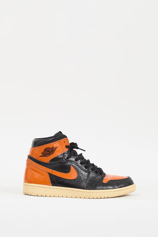 Nike Air Jordan Black 
Orange Retro High 1 Sneaker