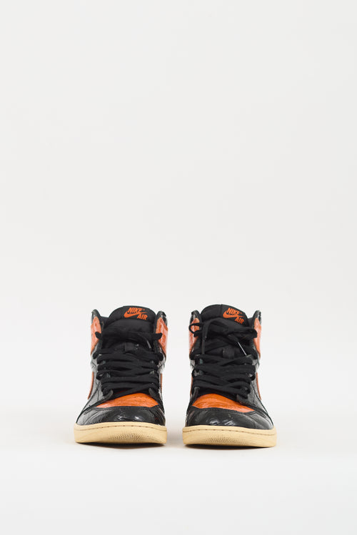 Nike Air Jordan Black 
Orange Retro High 1 Sneaker