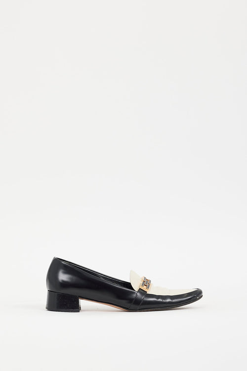 Prada Black 
Cream Leather Buckle Heeled Loafer