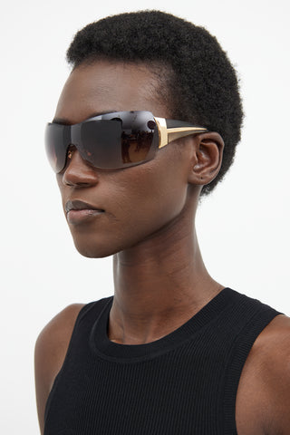 Prada Brown 
Gold SPR54G Shield Sunglasses