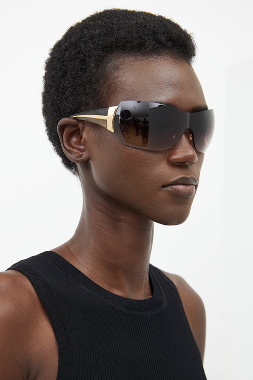 Prada Brown 
Gold SPR54G Shield Sunglasses