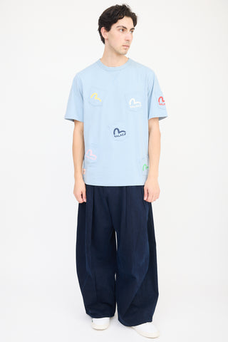 Palace X Evisu Blue 
Multicolour Logo Multi Pocket T-Shirt