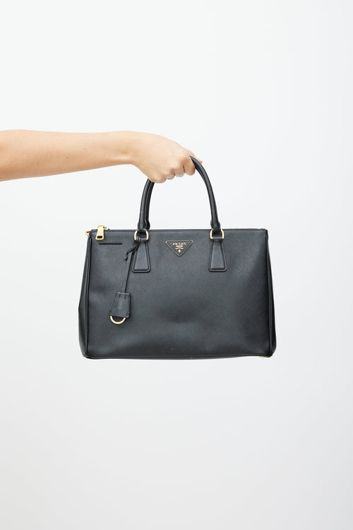 Prada Black 
Gold Galleria Saffiano Double Zip Bag