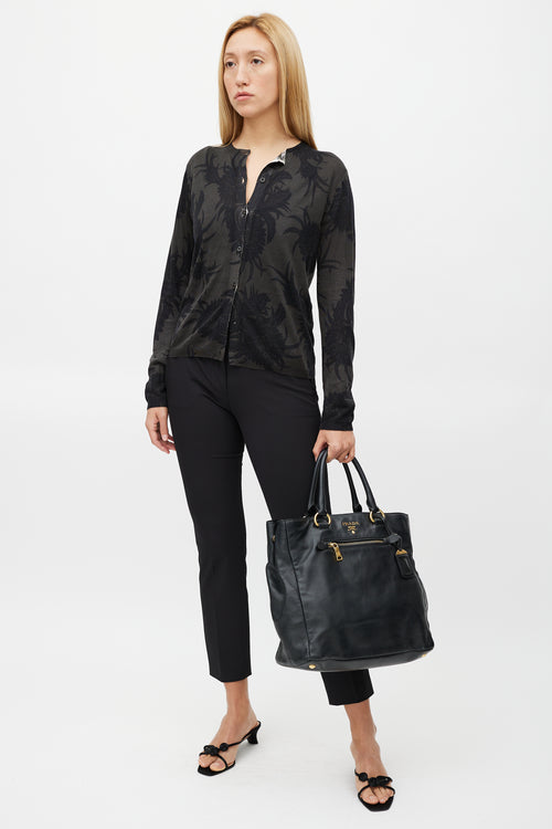 Prada Black 
Gold Leather Tote